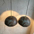 Add artistic elegance to your space with an Art of handmade copper teardrop light.