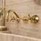 Handcrafted Brass Wall-Mounted Faucet with Classic Cross Handles