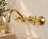 Handcrafted Brass Wall-Mounted Faucet with Classic Cross Handles