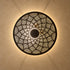 Handcrafted Moroccan Round Brass Wall Light – Pierced Metal Sconce with Warm Decorative Shadow Pattern
