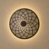 Handcrafted Moroccan Round Brass Wall Light – Pierced Metal Sconce with Warm Decorative Shadow Pattern