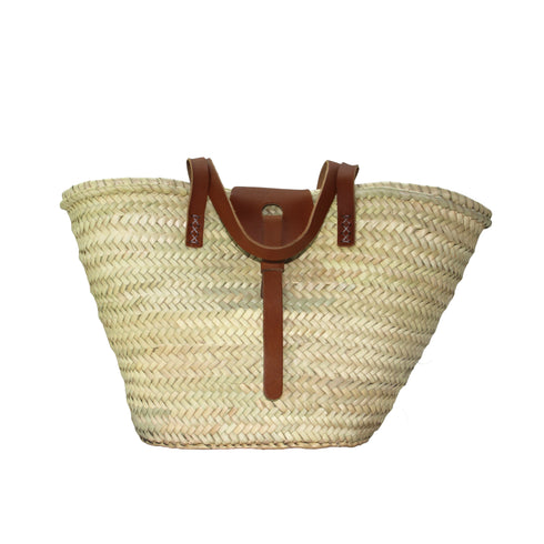Handwoven Moroccan straw basket with brown leather handles and front closure