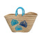 Handwoven Moroccan straw tote bag with blue shell embroidery and turquoise braided handles