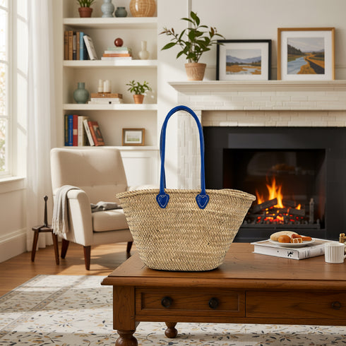 Handwoven Moroccan straw tote bag with long blue leather handles