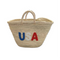 Handwoven straw tote bag with USA embroidered lettering in red, white, and blue
