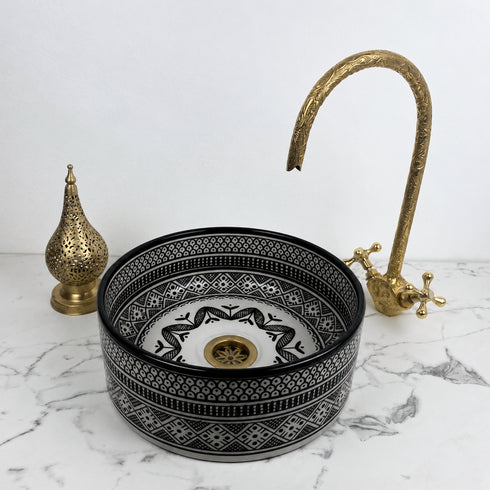 Illuminate your vanity with an Art of handmade ceramic round sink.