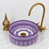 Illuminate your vanity with an Art of handmade ceramic round sink.