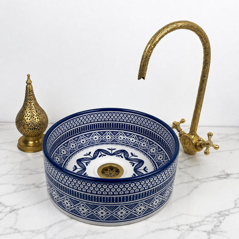 Illuminate your vanity with an Art of handmade ceramic round sink.