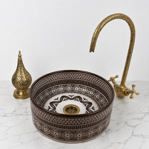 Illuminate your vanity with an Art of handmade ceramic round sink.