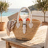 Handwoven Straw Tote Bag with White Leather Handles and Buckle