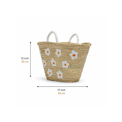 Large handwoven Moroccan straw basket with white embroidered flowers