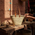 Moroccan straw basket with flat leather handles