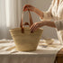 Moroccan straw basket with flat leather handles
