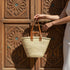 Moroccan straw basket with flat leather handles
