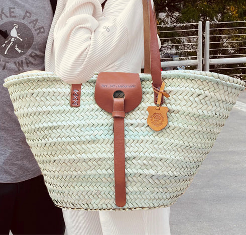 Large handwoven Moroccan straw basket with leather closure