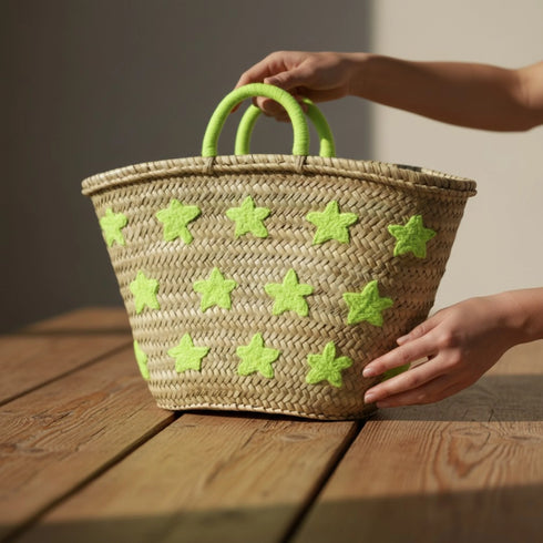 Large handwoven Moroccan straw basket with embroidered stars
