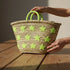 Large handwoven Moroccan straw basket with embroidered stars