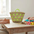 Large handwoven Moroccan straw basket with embroidered stars