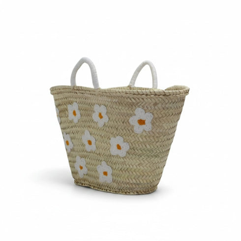Large handwoven Moroccan straw basket with white embroidered flowers