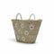 Large handwoven Moroccan straw basket with white embroidered flowers