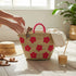 Large handwoven Moroccan straw basket with embroidered flowers
