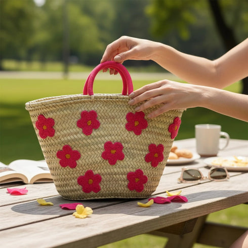 Large handwoven Moroccan straw basket with embroidered flowers