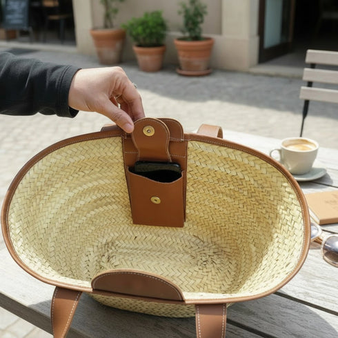 Large handwoven Moroccan straw basket with leather pocket