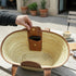 Large handwoven Moroccan straw basket with leather pocket