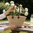 Handwoven Moroccan straw basket with simple leather handles