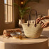 Handwoven Moroccan straw basket with simple leather handles