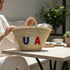Handwoven Moroccan straw basket with USA embroidery