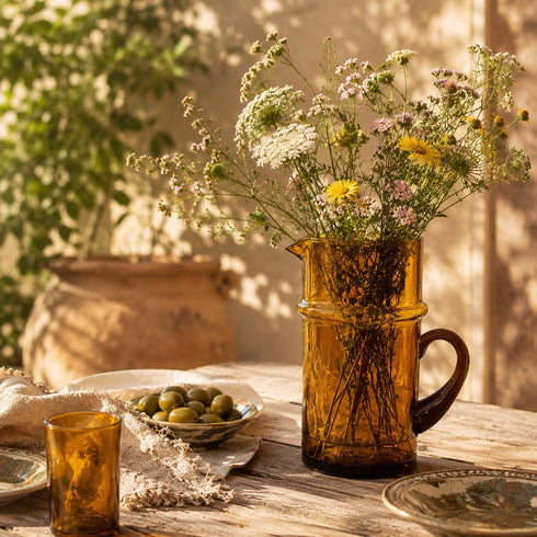 Complete your table service with an Art of handmade Moroccan Beldi glass pitcher.