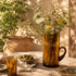 Complete your table service with an Art of handmade Moroccan Beldi glass pitcher.