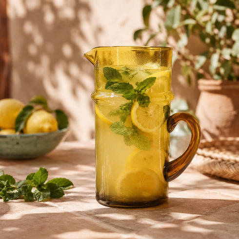 Complete your table service with an Art of handmade Moroccan Beldi glass pitcher.