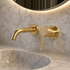 Oslo Cylindrical Wall-Mount Bathroom Faucet with Single Lever – Unlacquered Brass