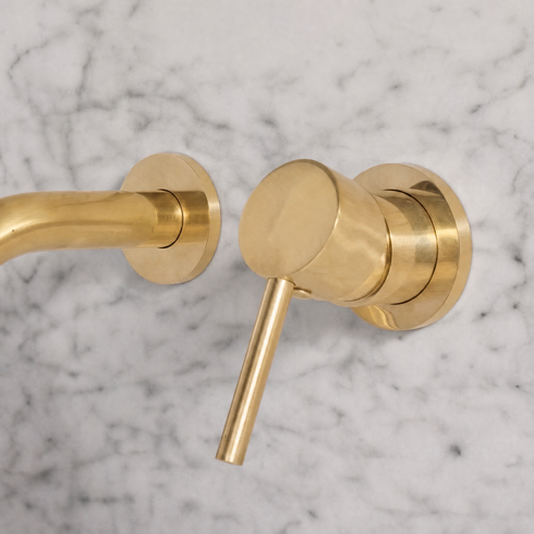 Oslo Cylindrical Wall-Mount Bathroom Faucet with Single Lever – Unlacquered Brass