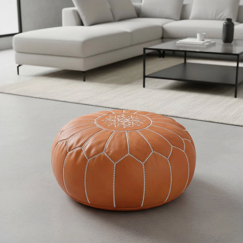 Enhance your living space with an Art of handmade Moroccan leather pouf.