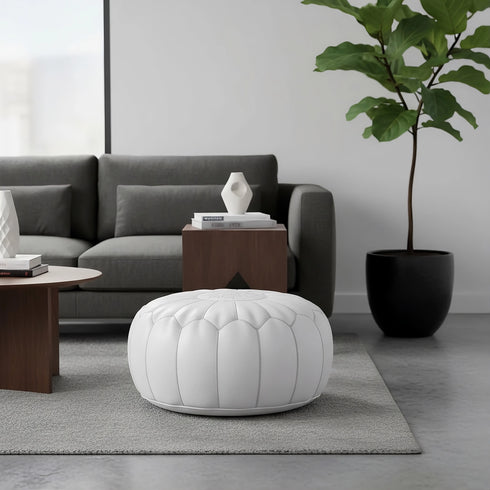 Enhance your living space with an Art of handmade Moroccan leather pouf.