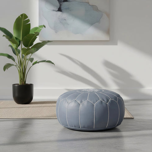 Enhance your living space with an Art of handmade Moroccan leather pouf.