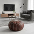 Enhance your living space with an Art of handmade Moroccan leather pouf.