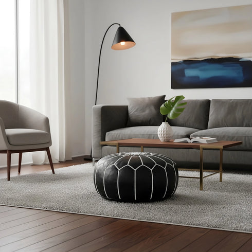 Enhance your living space with an Art of handmade Moroccan leather pouf.