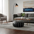 Enhance your living space with an Art of handmade Moroccan leather pouf.