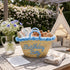 Handwoven Seagrass Basket with Blue Pom Poms and Handles