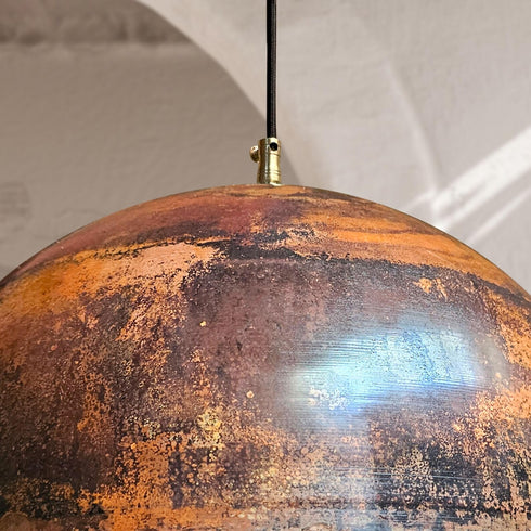Illuminate your dining space with a beautiful Art of handmade rustic copper pendant set.