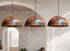 Illuminate your dining space with a beautiful Art of handmade rustic copper pendant set.