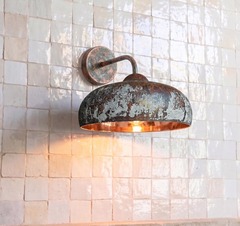 Illuminate your outdoor space with a stunning Art of handmade rustic copper sconce.