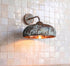 Illuminate your outdoor space with a stunning Art of handmade rustic copper sconce.