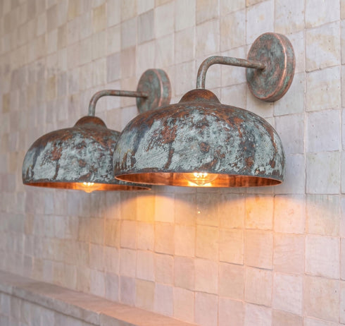 Illuminate your outdoor space with a stunning Art of handmade rustic copper sconce.