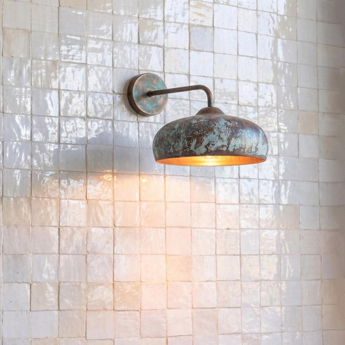 Illuminate your outdoor space with a stunning Art of handmade rustic copper sconce.