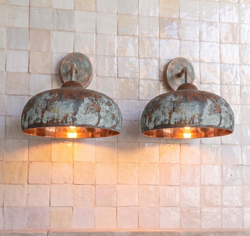 Illuminate your outdoor space with a stunning Art of handmade rustic copper sconce.